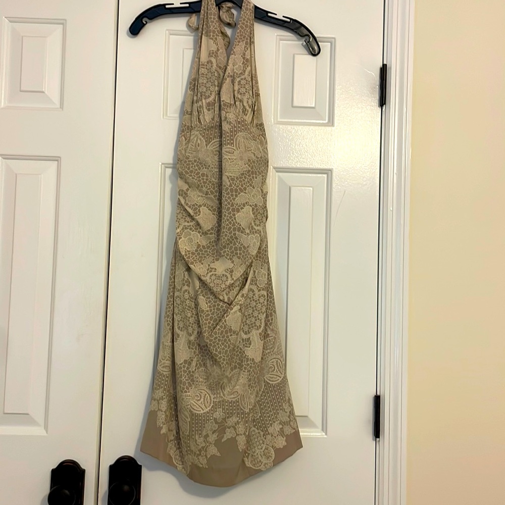 Nicole Miller, size 2 halter style, mid calf dress. Extremely flattering
